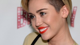 Miley Cyrus smiling