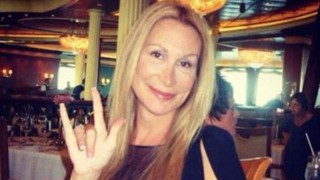 Michael Phelps' self-proclaimed girlfriend poses and gives the horns sign