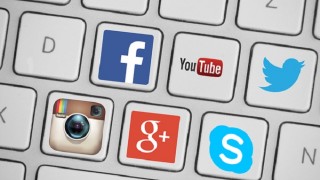 Social media logos on keyboard