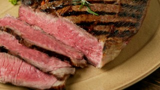 Steak red meat on a plate with rosemary