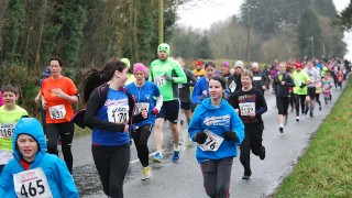 A group of people run a marathon