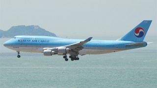 A Korean Air plane flying over water