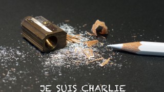 Pencil Sharpener and White pencil with Je Suis Charlie as text.