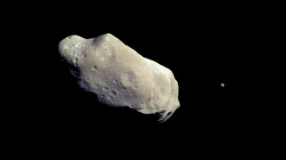 Asteroid flying through space.