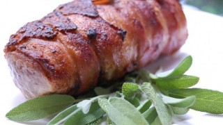 Bacon wrapped pork tenderloin with garnish