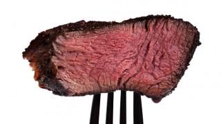 Photostock grilled meat on fork