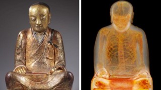 Buddha statue with full human skeleton inside of it