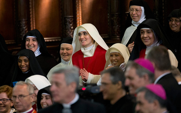 Nuns gaze at pope