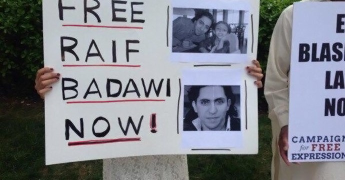 Pictured is a supporter of Badawi's