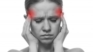Woman Having A Migraine photostock
