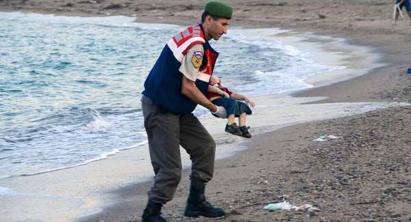 Turkish officer picks up child